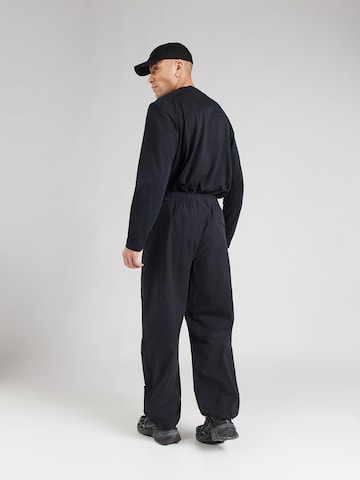 Nike Sportswear Ohlapna forma Funkcionalne hlače 'Tech' | črna barva