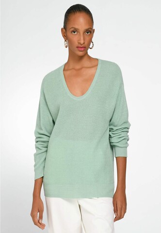 include Sweater in Green: front