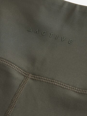 Skinny Leggings di Next in verde