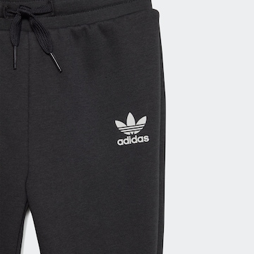 ADIDAS ORIGINALS Sweatsuit 'Rekive' in Black