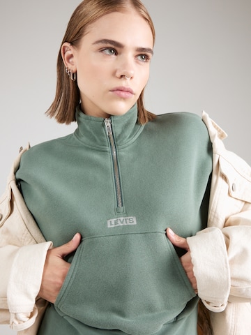 LEVI'S ® Sweatshirt 'Graphic Sara 1/4 Zip' in Grün