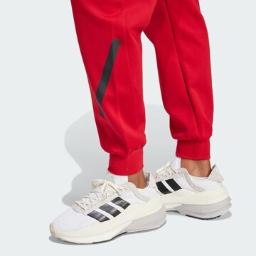 Effilé Pantalon de sport 'Z.N.E.' ADIDAS SPORTSWEAR en rouge