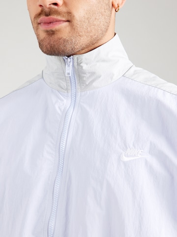 Nike Sportswear Overgangsjakke 'CLUB' i blå