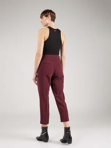 regular Pantaloni con pieghe 'Tapiah' di BOSS Black in rosso