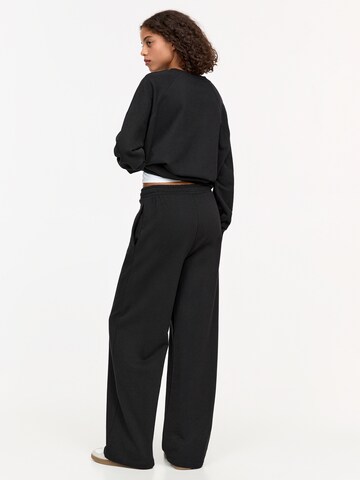Wide leg Pantaloni di Pull&Bear in nero