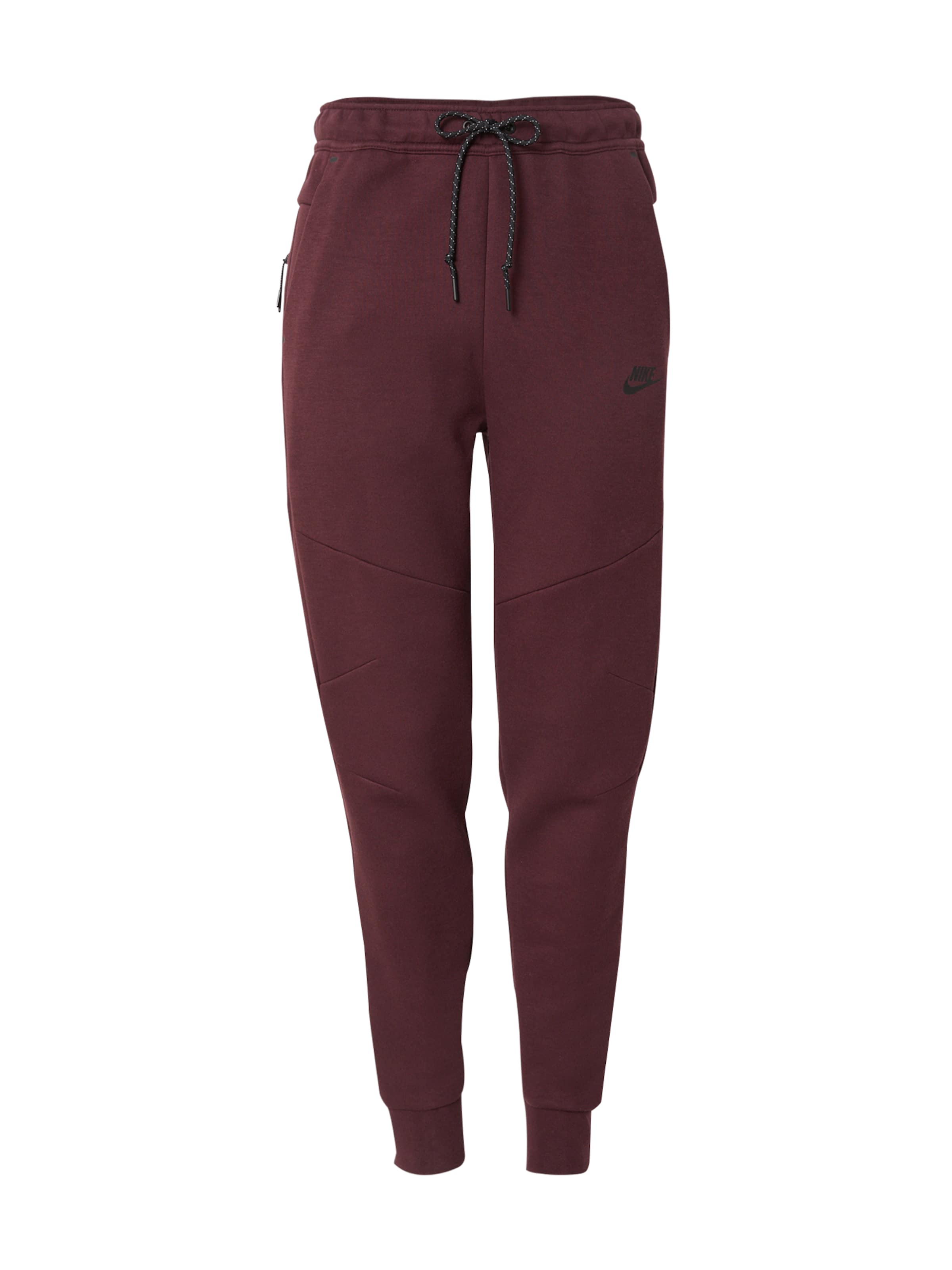 Tapered Pantaloni 'TCH FLC' di Nike Sportswear in rosso: frontale