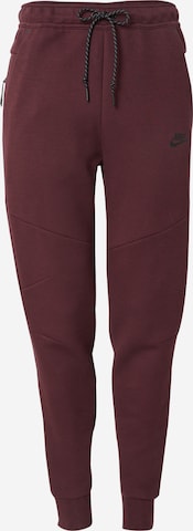Nike Sportswear - Calças 'TCH FLC' em vermelho: frente
