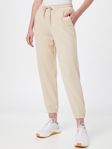 DeFacto Tapered Trousers in Beige: front