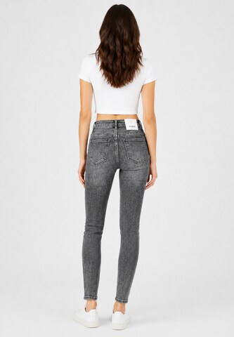 Skinny Jeans di Elara in grigio