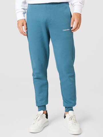 Calvin Klein Tapered Trousers in Blue: front