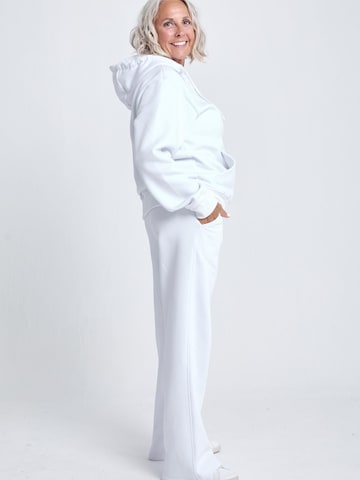 évasé Pantalon de sport 'Cotton Sweatpants' SPORTKIND en blanc