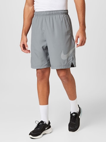 NIKE Loosefit Sportovní kalhoty – šedá: přední strana