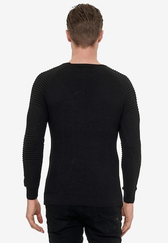 Rusty Neal Figurbetonter Feinstrick Pullover in Schwarz