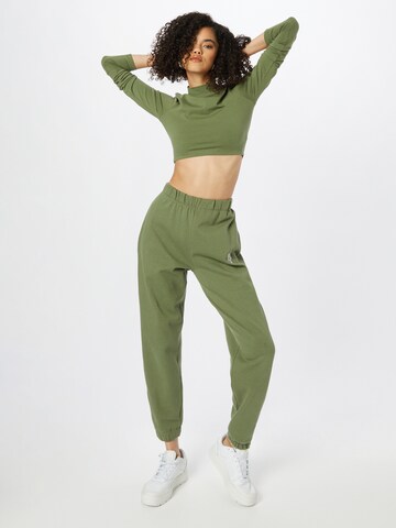 ABOUT YOU x INNA Tapered Pants 'Sandra' in Green