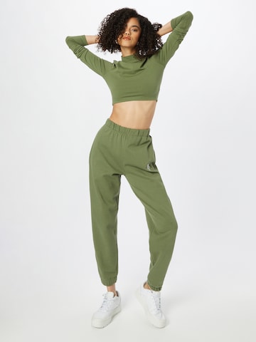 Effilé Pantalon 'Sandra' ABOUT YOU x INNA en vert