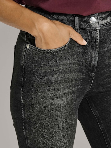 MADELEINE Bootcut Jeans in Schwarz