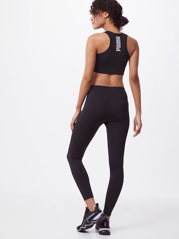 Skinny Pantaloni sport de la PUMA pe negru