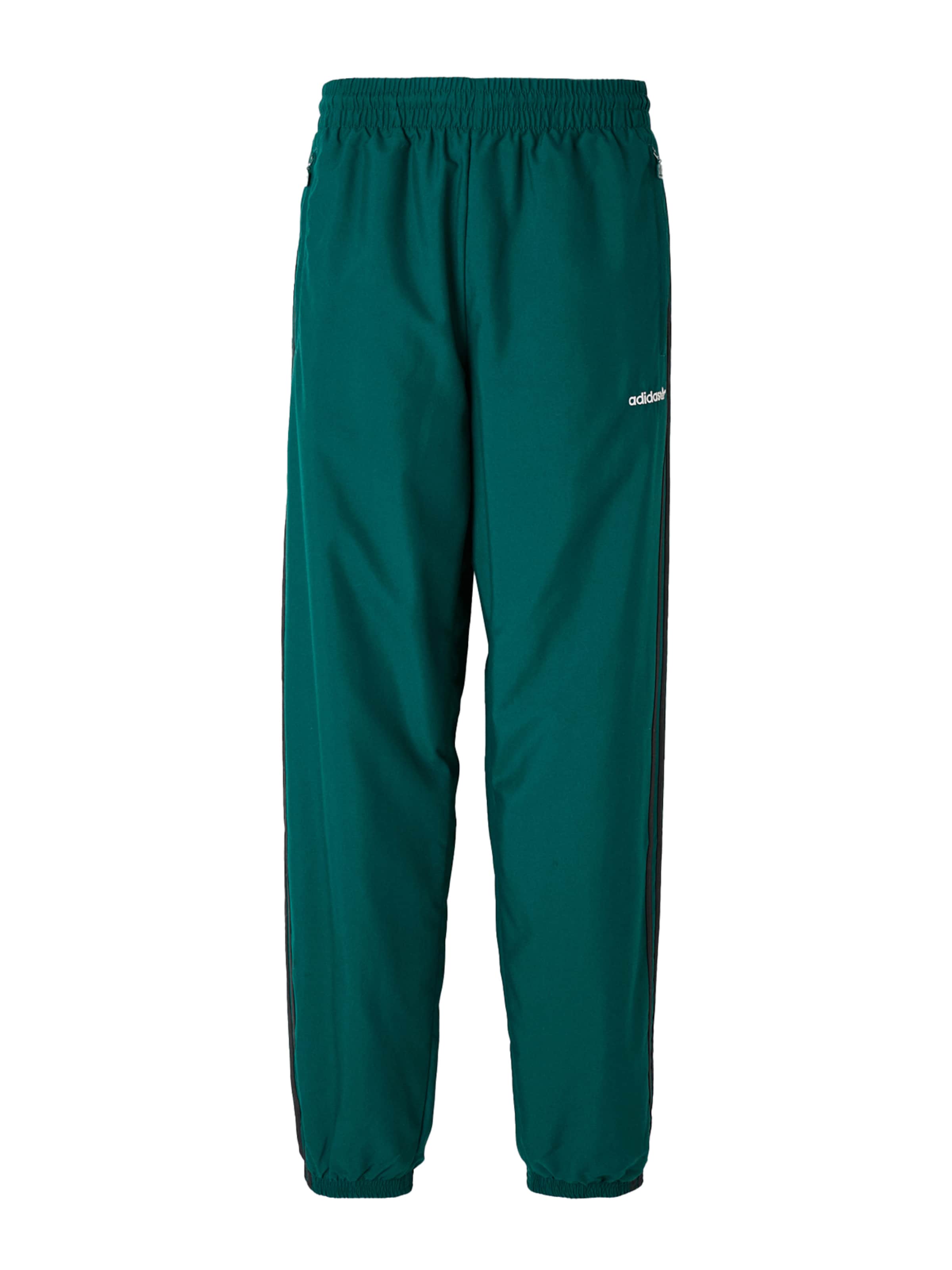 Tapered Pantaloni di ADIDAS ORIGINALS in verde: frontale