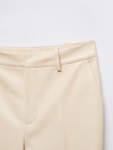 MANGO Wide leg Pressveckad byxa 'City' i beige