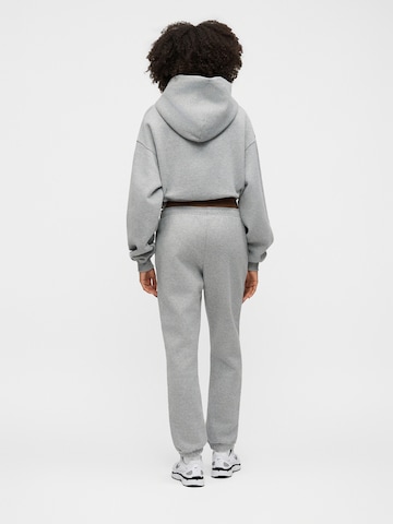 Nike Sportswear Zwężany krój Spodnie w kolorze szary
