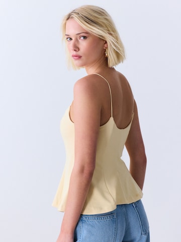 Haut Next en jaune