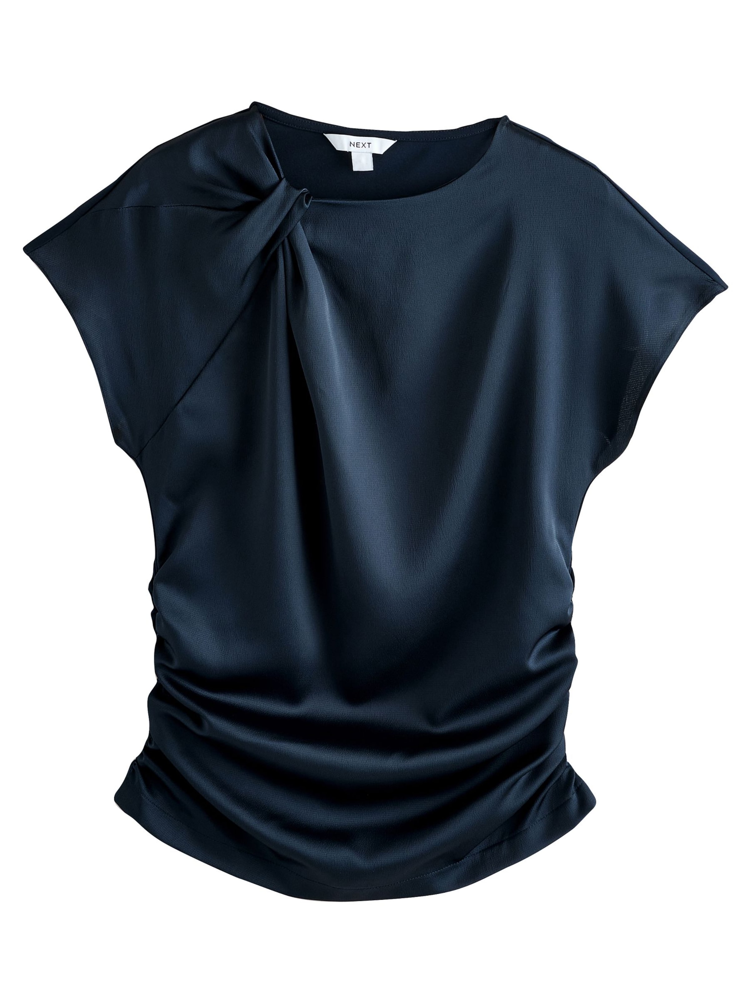 Next T-shirt i blå: framsida