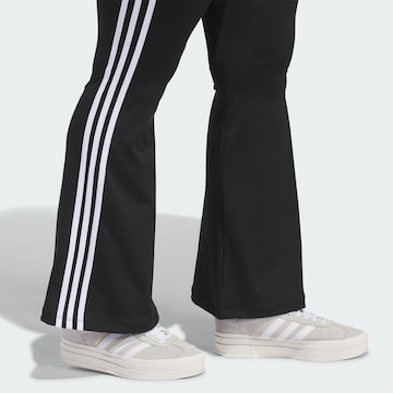 Evazați Leggings de la ADIDAS ORIGINALS pe negru