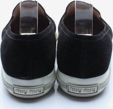 Miu Miu Flats & Loafers in 36 in Black