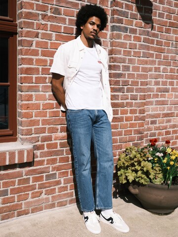 Loosefit Jean '555™ Relaxed Straight Jeans' LEVI'S ® en bleu
