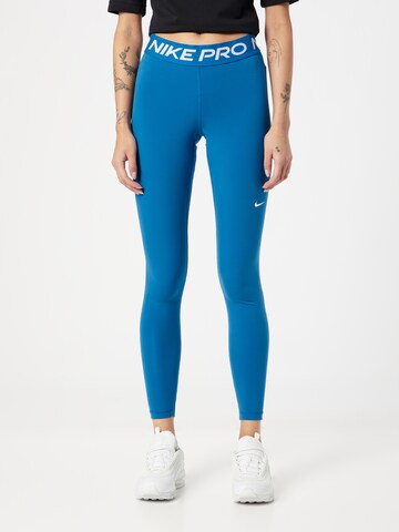 NIKE Skinny Sportovní kalhoty – modrá: přední strana