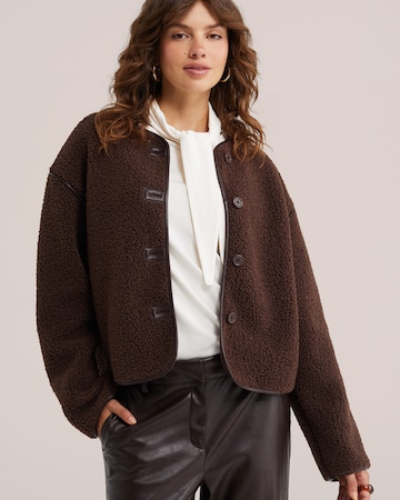 Jachetă  fleece de la WE Fashion pe maro: față