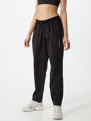 ADIDAS TERREX Loose fit Outdoor Pants in Black: front