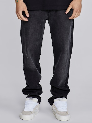 Tapered Jeans di SikSilk in nero: frontale