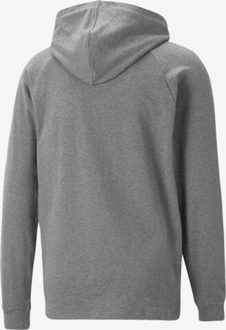 PUMA - Sweatshirt de desporto em cinzento