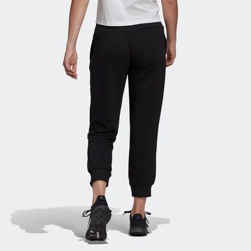 ADIDAS SPORTSWEAR Tapered Παντελόνι φόρμας 'Essentials' σε μαύρο