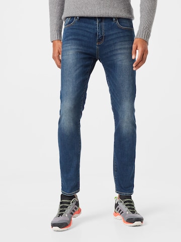 Slimfit Jeans de la Superdry pe albastru: față