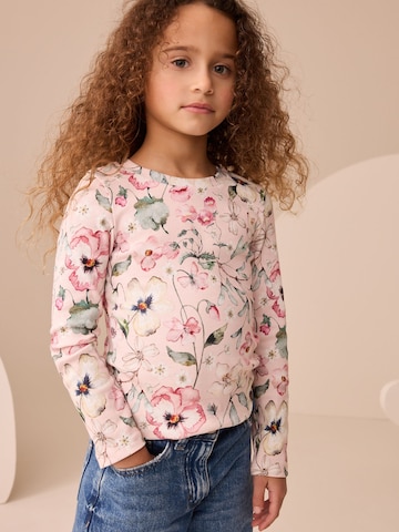 Tricou de la Next pe roz: față