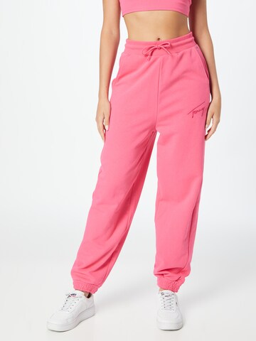 Tommy Jeans - Tapered Calças em rosa: frente