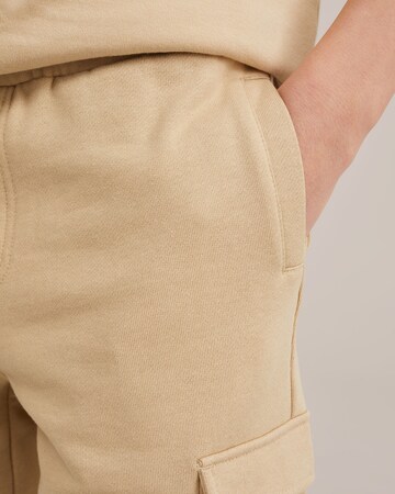 WE Fashion Regular Trousers in Beige