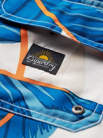 Superdry & Co Plavecké šortky – modrá