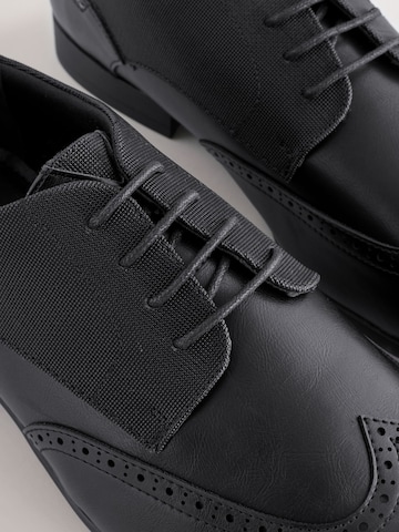 Next Čevlji na vezalke | črna barva