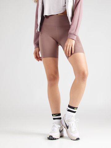 Skinny Pantalon de sport 'GO' NIKE en violet : devant