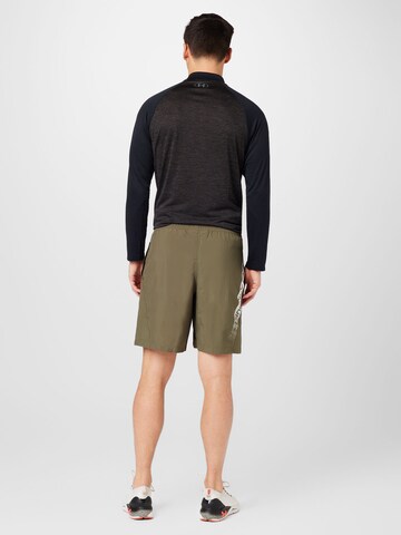 regular Pantaloni sportivi di UNDER ARMOUR in verde