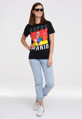 LOGOSHIRT Shirt 'Super Mario - Jump' in Zwart