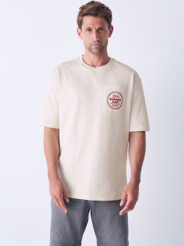 T-Shirt Next en blanc : devant