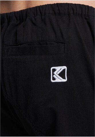 Loosefit Pantaloni de la Karl Kani pe negru