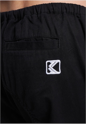 Karl Kani Lużny krój Spodnie w kolorze czarny