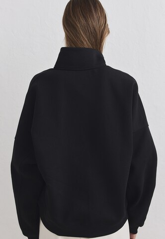 Felpa sportiva 'Varsity' di Aim'n in nero