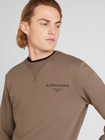 BJÖRN BORG Sportsweatshirt 'ESSENTIAL' in Braun