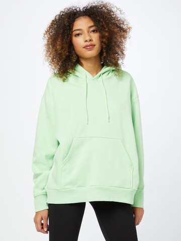 Sweat-shirt 'Alisa' WEEKDAY en vert : devant